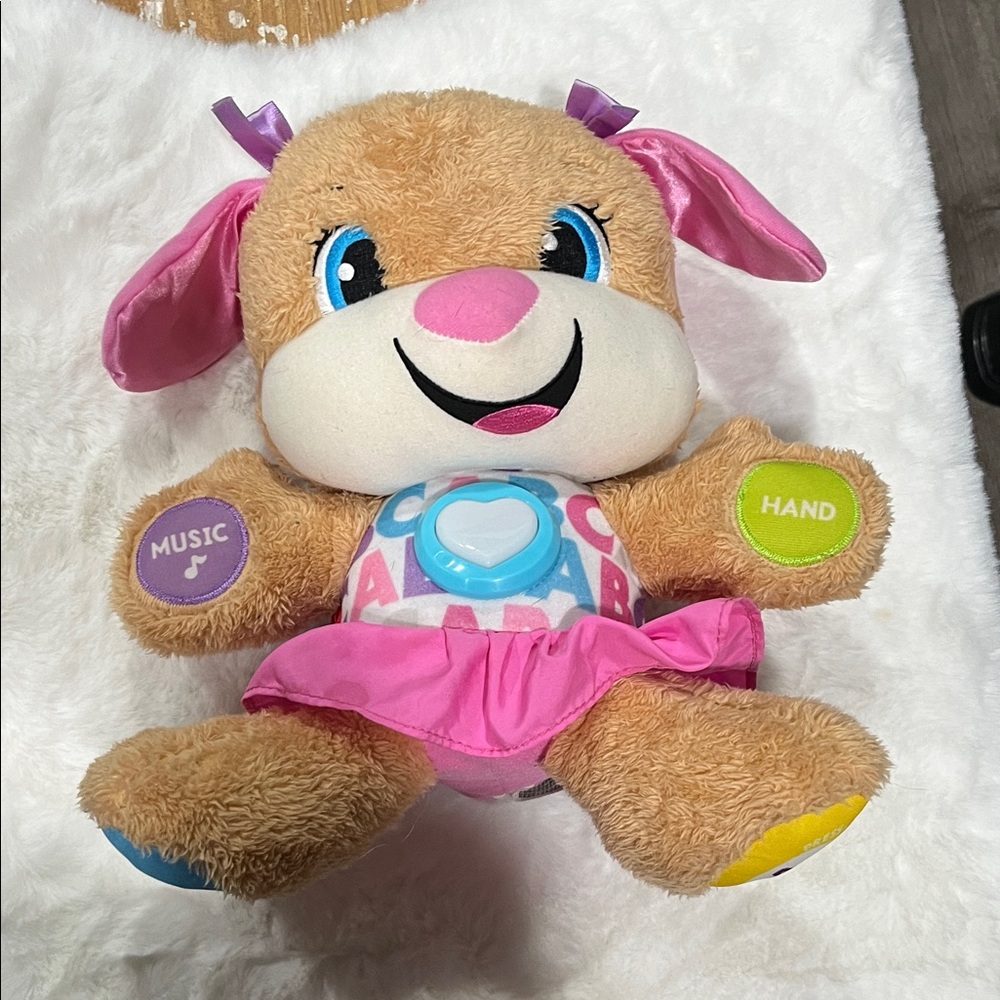 Fisher-Price Interactive Plush Puppy with Pink Skirt and Blue Eyes